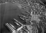 Aerial view of Wellington wharves and railway yards