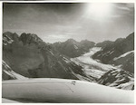 Title
Tasman Glacier

Publicity Caption
A Mount Cook Air Services ski-plane takes off after landing Dick Barrymore's American skiers at the head of the Ball Pass, high in New Zealand's Southern Alps. Formerly a four-hour climb from the Ball Hutt ski base at the junction of the Ball and Tasman Glaciers, this point is now reached by a flight of only a few minutes from the Hermitage hotel. Skiers landing here face an exhilirating three mile downhill run to the Ball Hutt. The record (three mins, 37 secs) is still held by Dick Durrance, an American Skier of the 1930s.

Photographer
Robin Gaye.