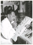 Title
Maori Carving

Publicity Caption
Mr. Charles Tuarau carving a small panel.

Photographer
Mr. D. Nicholson.