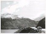 Title
Haast Road

Publicity Caption
Lake Wanaka, Mt. Albert on left, Mt. Gilbert on right.

Photographer
Mr. Anderson.