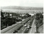Title:
Dunedin City

Publicity Caption:
View down Stuart Street, Dunedin

Photographer:
R Anderson
