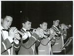 Title:
Maoris - Children

Publicity Caption:
Maori Music - Members of the Ratana Junior Brass Band, David Williams, Paul, Peter and Glenny Maraka, who are brothers.

Photographer:
Mr Anderson