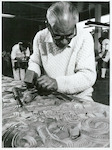 Title:
Maoris - Carving

Publicity Caption:
Mr John Taiapa, Head Carver at the Maori Arts and Crafts Institute, Rotorua

Photographer:
R Anderson