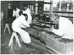 Title:
Maoris - Carving

Publicity Caption:
John Taiapa and Maori apprentices working on a carving for Expo 70 at Maori Arts and Crafts Institute, Rotorua, Auckland Province

Photographer:
R Anderson