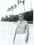 Title:
Pacific Islands - Cook Islands - Rarotonga - People

Publicity Caption:
Rarotonga
Honourable A.R. Henry, Premier of the Cook Islands, relaxes at the beach, Rarotonga.

Photographer:
W. Cleal