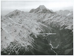 Title:
Canterbury - Southern Alps

Publicity Caption:
Cessna Ski Plane over Hooker Glacier, Mount Cook in the background, Canterbury.

Photographer:
R. Anderson