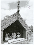 Title:
Maoris - Carving 

Publicity Caption:
Master carver John Taiapa teaching two Maori youths carving, Rotorua 

Photographer:
R Anderson