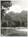 Title:
Fishing - Trout

Publicity Caption:
Peter Donaghy, a fishing guide with the Hollyford Tourist and Travel Co., fishing for brown trout in the Hollyford River. Skippers Range is in the background, Fiordland National Park. Otago

Photographer:
R. Anderson
