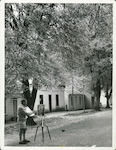 Title:
Otago - Arrowtown

Publicity Caption:
Queenstown artist Charles McKenzie paints Autumn scenes in the main street of Arrowtown.

Photographer:
Mr Nicholson