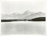 Title:
Power Projects - Hydro Electric

Publicity Caption:
From the settling pond of Tekapo "B" Canal, looking across Lake Pukaki, to Mt. Cook. Upper Waitaki Power Development.

Photographer:
J. Waddington.