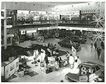 Title:
Shops

Publicity Caption:
Interior views of St Lukes shopping mall at Mount Albert.  This is one of the most modern shopping areas in New Zealand.  Auckland Province.

Photographer:
Anderson.