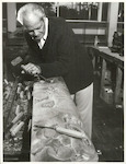 Title:
Maoris - Carving

Publicity Caption:
Dr John Taiapa, Master Carver at the Maori Arts and Crafts Centre, Whakarewarewa

Photographer:
R Anderson