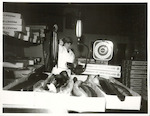 Title:
Fishing - Eel

Publicity Caption:
Eels being packed for export to Holland, Germany, France, United Kingdom, South Africa, etc. Thomas Richard's factory, Whenuapai.

Photographer:
G Riethmaier