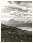 Title:
Canterbury - Pukaki, Lake

Publicity Caption:
Taken from the road to Mt. Cook showing Lake Pukaki at right, and Mt. Cook range in the background

Photographer:
T. Hann
