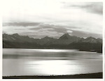 Title:
Canterbury - Pukaki, Lake

Publicity Caption:
Lake Pukaki, Mt Cook is seen on the horizon in the distance, also Mt. Sefton (to the left)

Photographer:
T. Hann