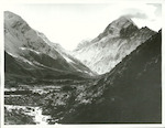 Title:
Canterbury - Cook, Mt.

Publicity Caption:
Mt. Cook with the Hooker Valley river in the foreground. The cloud on the peak of Mt. Cook is called a Hogs Back", snow whipped up by the wind

Photographer:
T. Hann