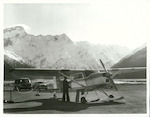 Title:
Transport - Air - Aircraft

Publicity Caption:
A ski plane at Mt. Cook airport. Mt. Sefton is seen to the left of the picture

Photographer:
T. Hann