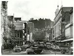 Title:
Otago - Dunedin City - Streets

Publicity Caption:
View along Stuart Street towards the Octagon, Dunedin

Photographer:
R Anderson