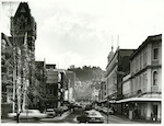 Title:
Otago - Dunedin City - Streets

Publicity Caption:
View along Stuart Street towards the Octagon, Dunedin

Photographer:
R Anderson