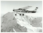 Title: 
TRANSPORT - Air - Aircraft

Publicity Caption:
An Air Safaris plane seen against Mt. Cook, Canterbury (x 7)

Photographer:
J. Waddington