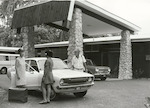 Title: 
Pacific Islands - Cook Islands - Rarotonga - People

Publicity Caption:
Mrs Johnston, receptionist, John Davey, in front of Trailways Hotel, Rarotonga  

Photographer:
Neill