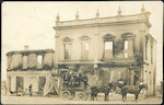 Photograph - Group from Timaru Volunteer Fire Brigade [unnamed except for Arthur Edward Holmes] - on horse-drawn appliance outside burnt shell of building named 'F Nelligan, Railway and Commercial Hotel' - Pleasant Point, South Canterbury - 132 x 87 mm