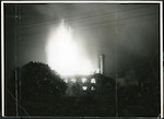 Photograph [Overseas Press] - photo shows forty foot high flames during a blaze at flour mills at Bishop's Stortford, Herts - 23 June 1935 - photographer/source: Ernest Williams, Bishop's Stortford - 216 x 158 mm
