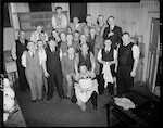 CAPTION: NZR [New Zealand Railways Department] rugby football. Group of cooks and other helpers at dinner.

PHOTOGRAPHER: J.G. Duncan and J.F. Le Cren

DATE: 9 August 1952