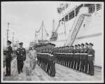 Queen Elizabeth and Guard Commander Seal approach the end of the first row of Royal Guards at Her Majesty's Inspection on Bluff Wharf, 30 January 1954